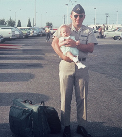 David with daughter in July 1970 departing for Southeast Asia