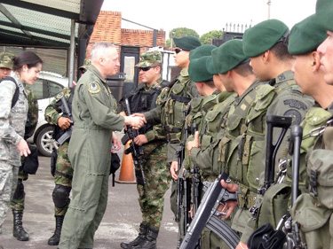 General Carlson thanks those who provided security for him in Bogota, Columbia General Carlson at the airport as he departs Bogotá Columbia in 2008. This is the group of young men who escorted him everywhere during their two-day visit to Columbia.