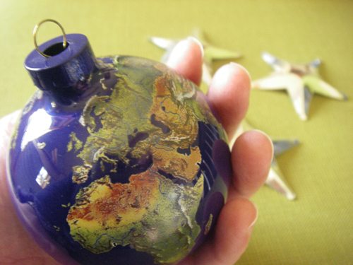 Globe ornament and star ornaments on my Living Christ Christmas Tree