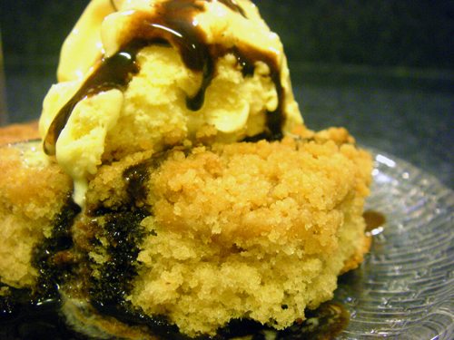 peanut butter coffee cake with ice cream and chocolate syrup